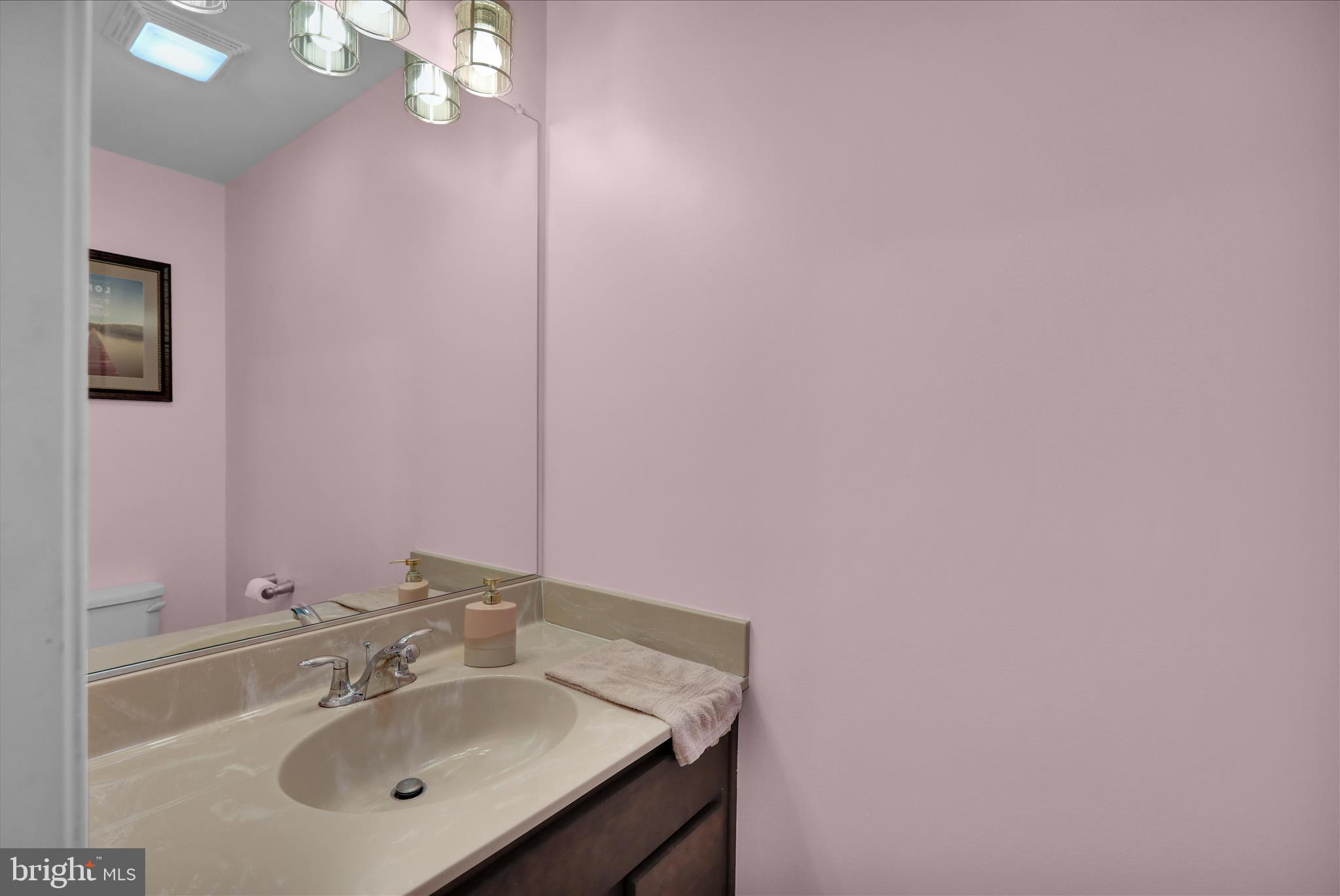 402 Mountainside Road Temple, PA 19560 - Photo 28 of 75 a bathroom with a sink and a mirror