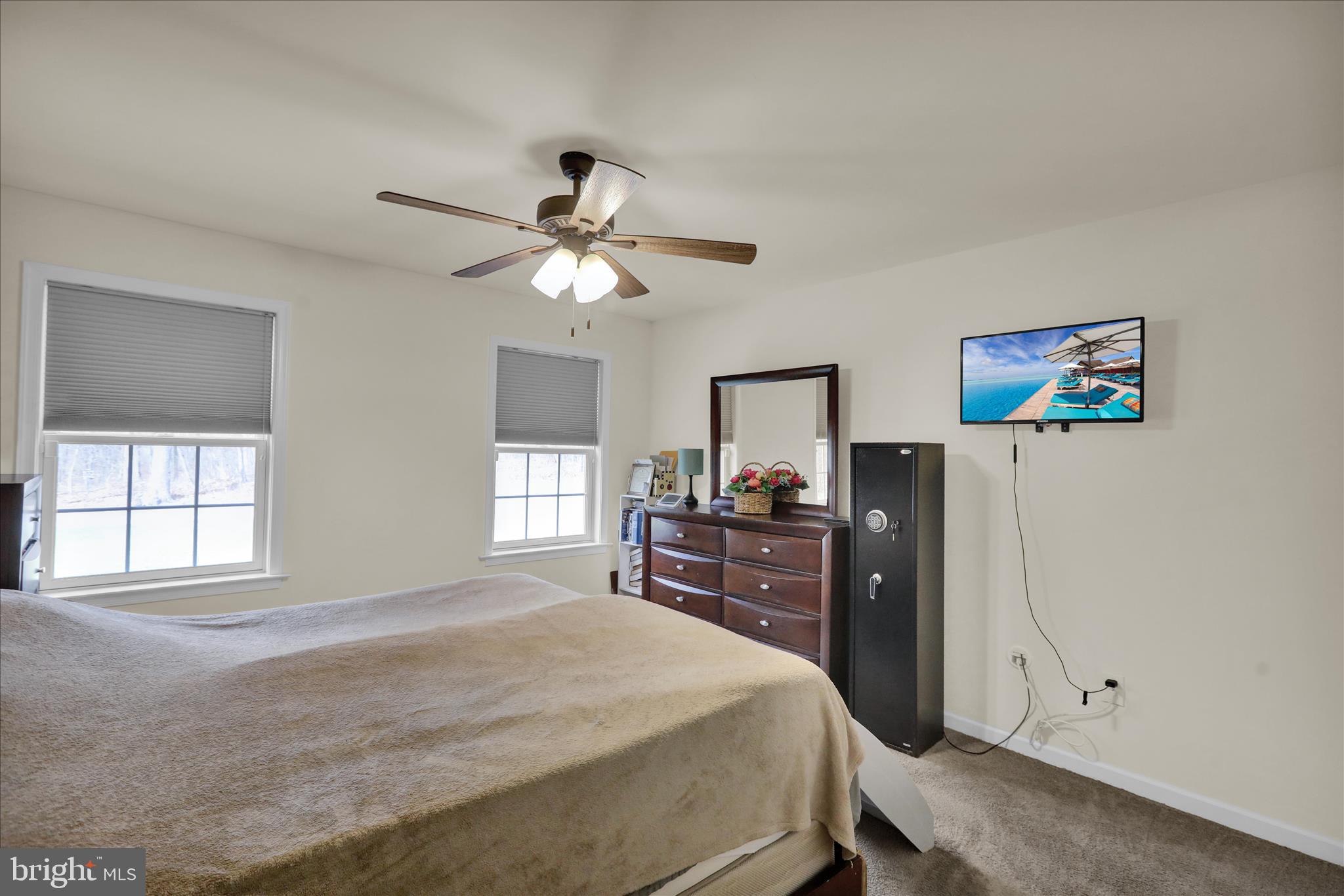 402 Mountainside Road Temple, PA 19560 - Photo 30 of 75 a bedroom with a bed and a flat screen tv