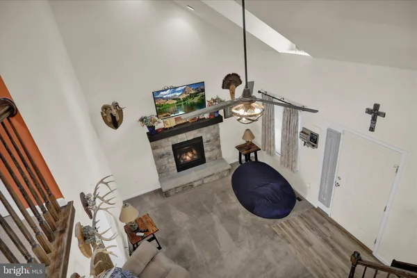 a room with gym equipment and a flat screen tv
