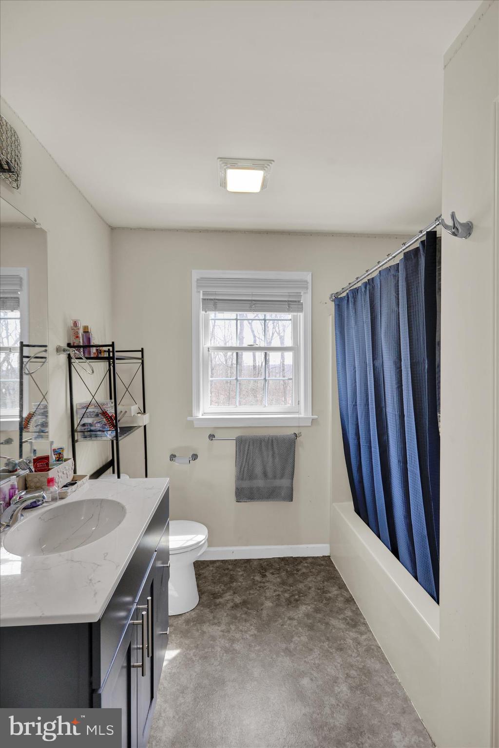 402 Mountainside Road Temple, PA 19560 - Photo 38 of 75 a bathroom with a sink toilet and shower