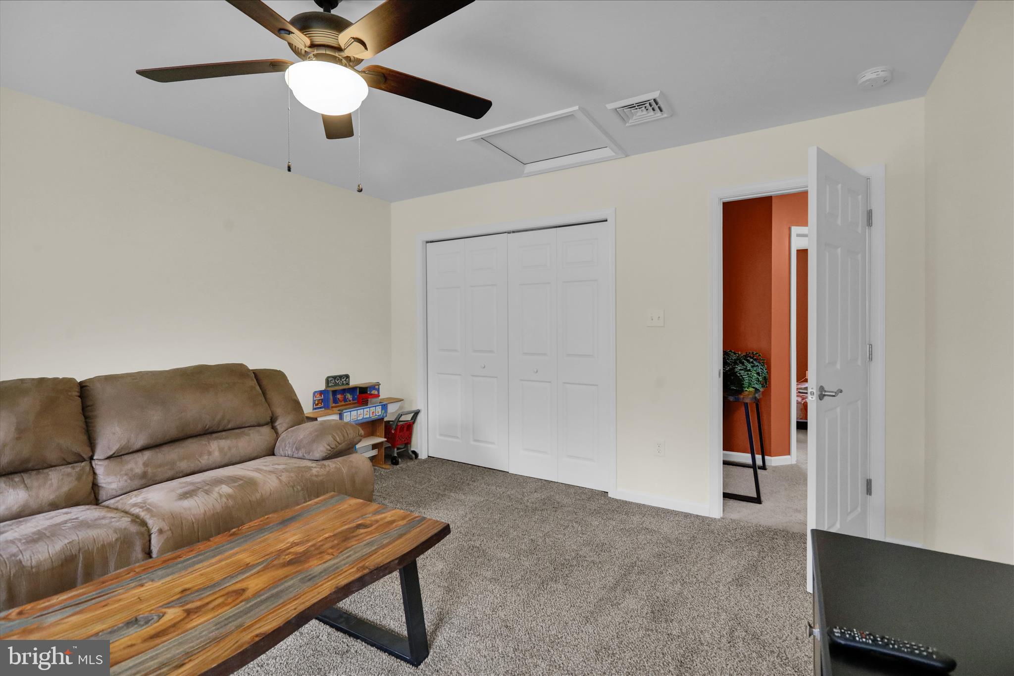 402 Mountainside Road Temple, PA 19560 - Photo 42 of 75 a living room with furniture and a ceiling fan