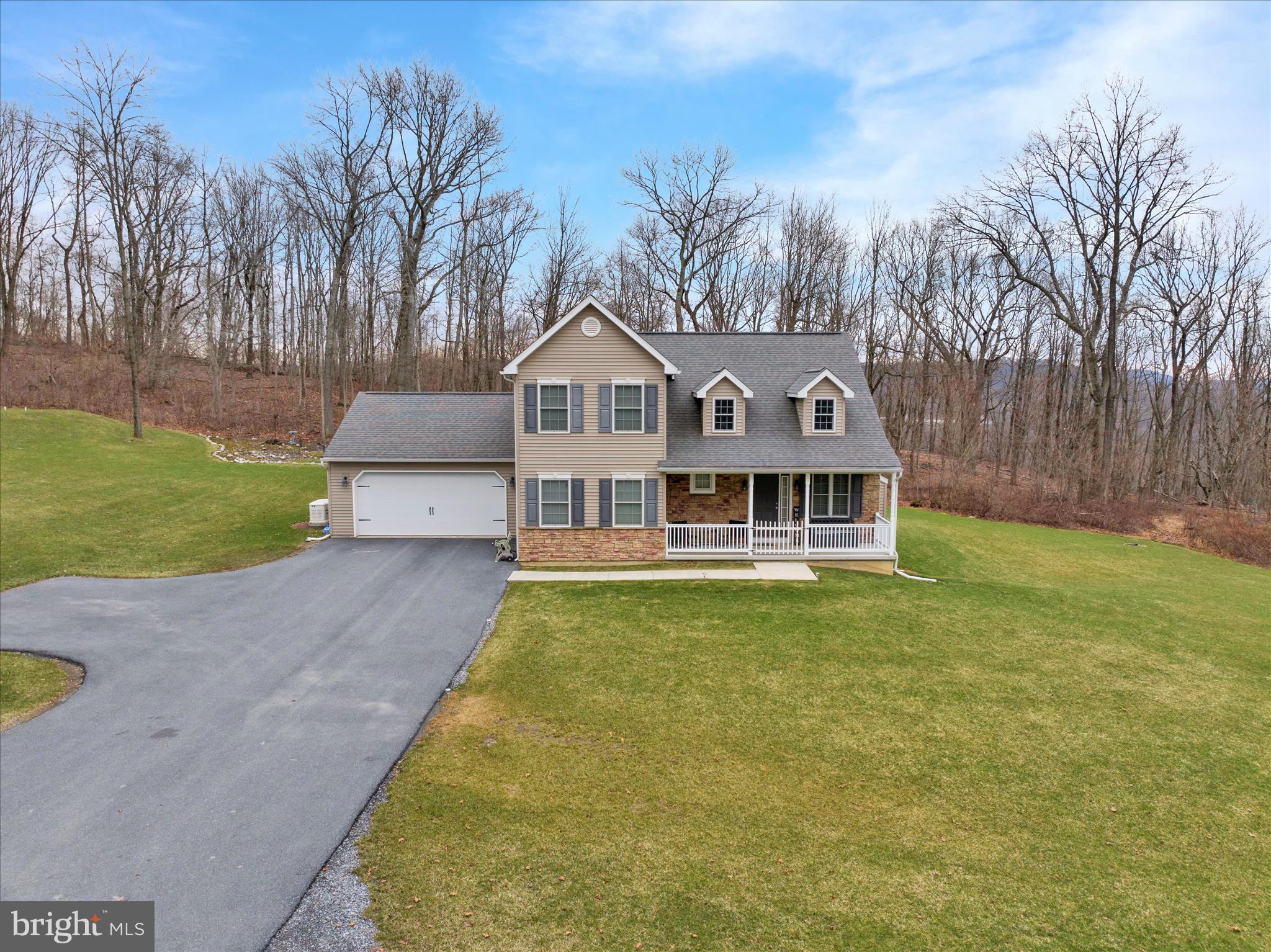 402 Mountainside Road Temple, PA 19560 - Photo 52 of 75 a view of a house with a big yard and large trees