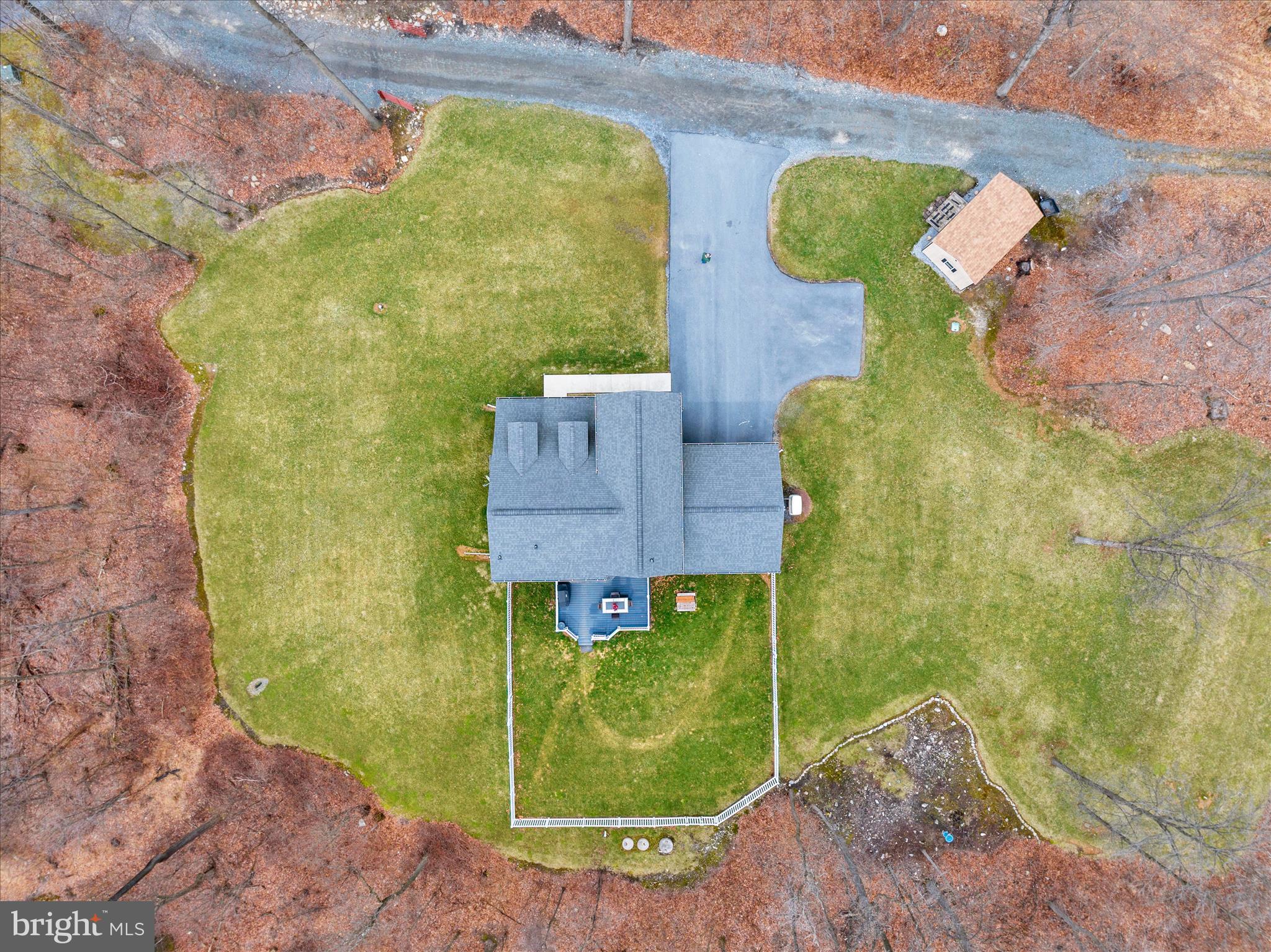402 Mountainside Road Temple, PA 19560 - Photo 59 of 75 an aerial view of a house with a swimming pool