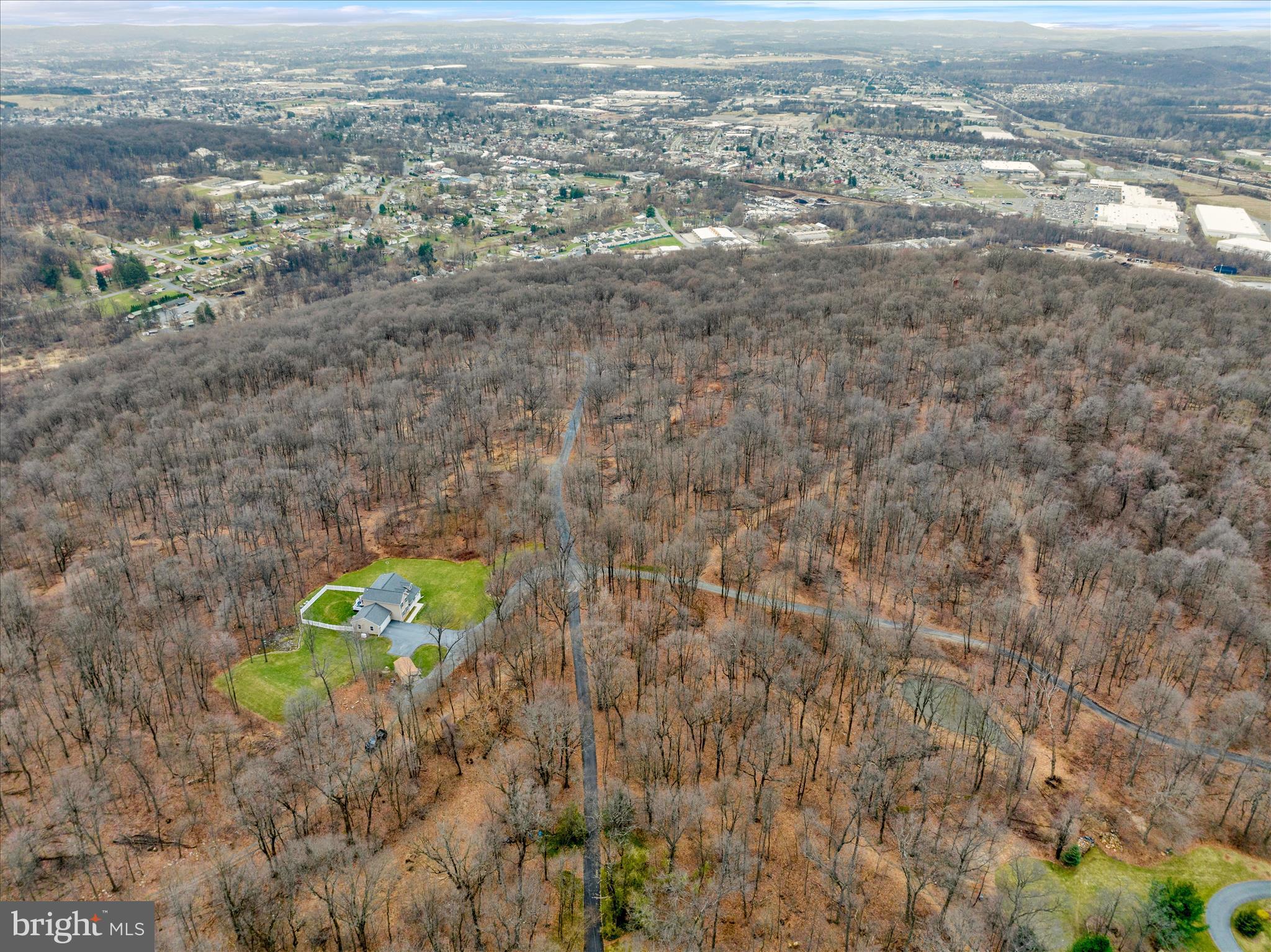 402 Mountainside Road Temple, PA 19560 - Photo 70 of 75 a view of a yard with a mountain