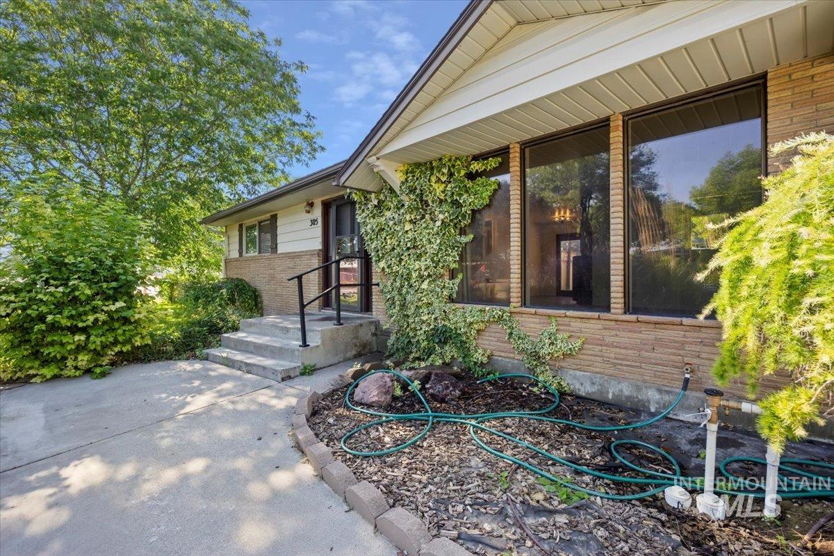 305 Lucille Street Kimberly, ID 83341 - Photo 4 of 36 Entrance to property with brick siding