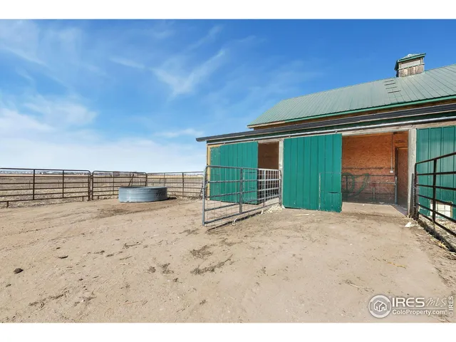 a view of a backyard of the house