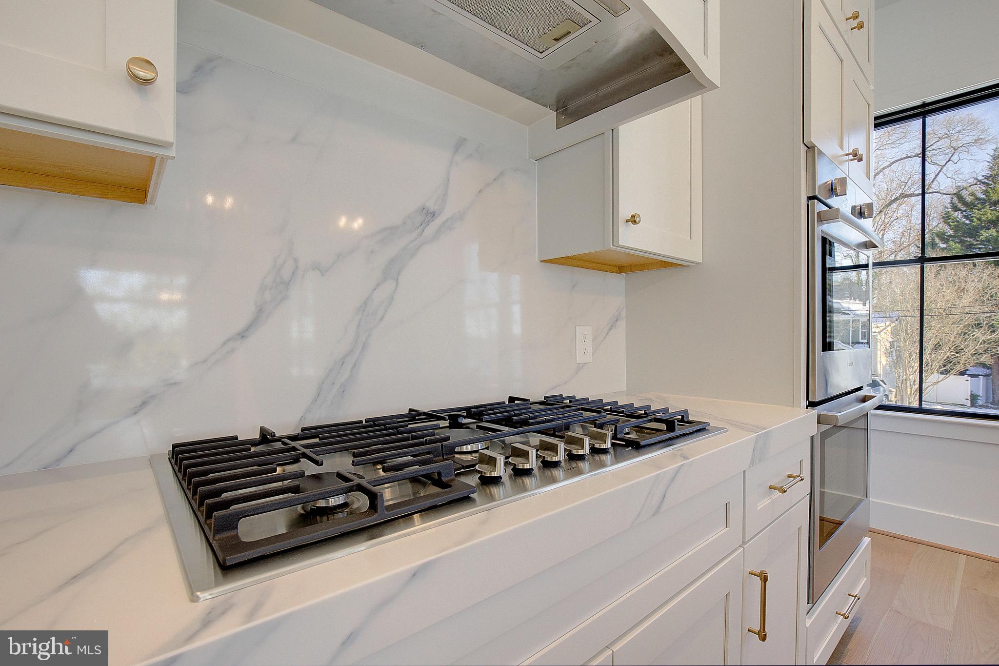 13 Elliott Road Annapolis, MD 21403 - Photo 11 of 14 a stove top oven sitting inside of a kitchen