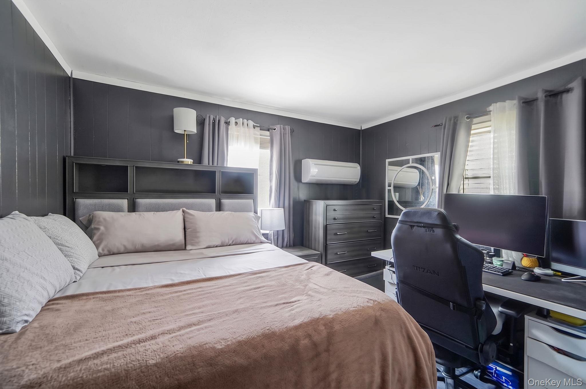 85 Applegate Drive Central Islip, NY 11722 - Photo 11 of 33 a bedroom with a bed and wooden floor