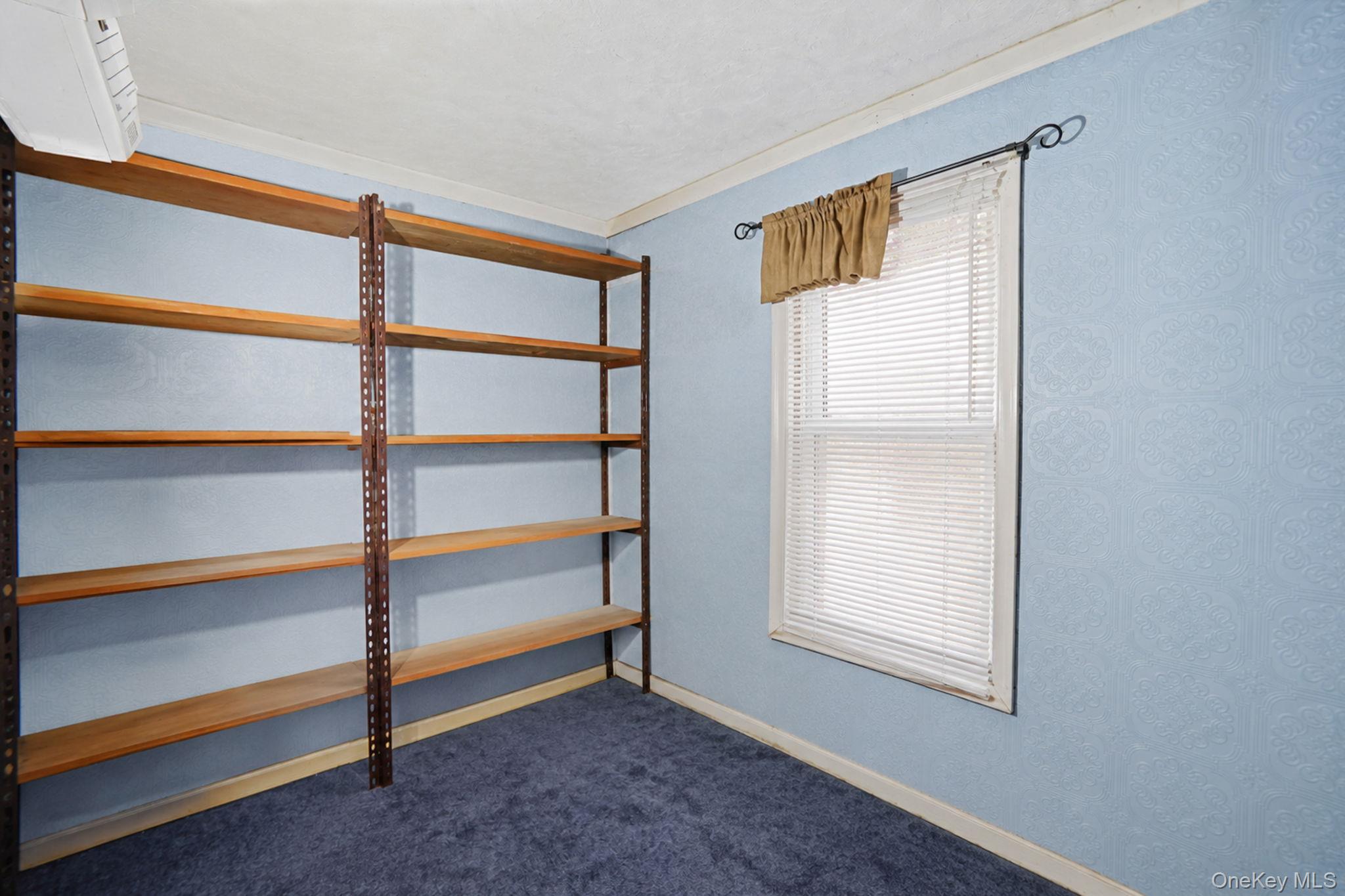 85 Applegate Drive Central Islip, NY 11722 - Photo 15 of 33 a view of room with window and closet