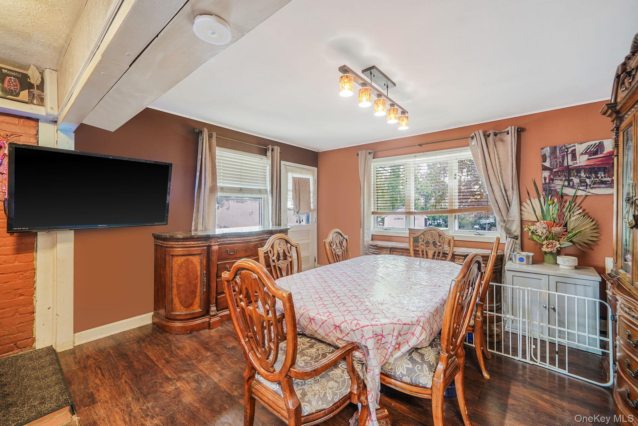 85 Applegate Drive Central Islip, NY 11722 - Photo 7 of 33 a view of a dining room with furniture window and wooden floor