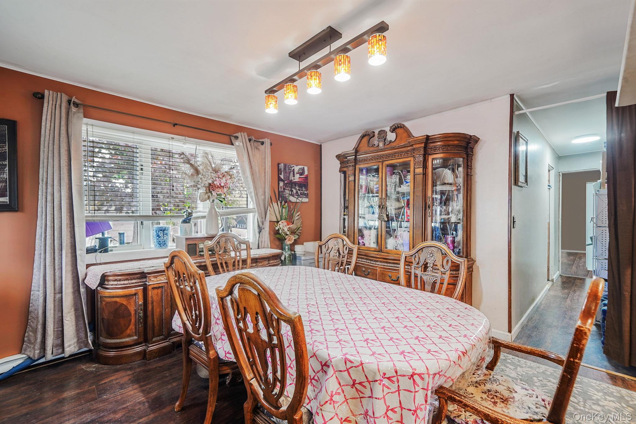 85 Applegate Drive Central Islip, NY 11722 - Photo 8 of 33 a view of a dining room with furniture window and outside view