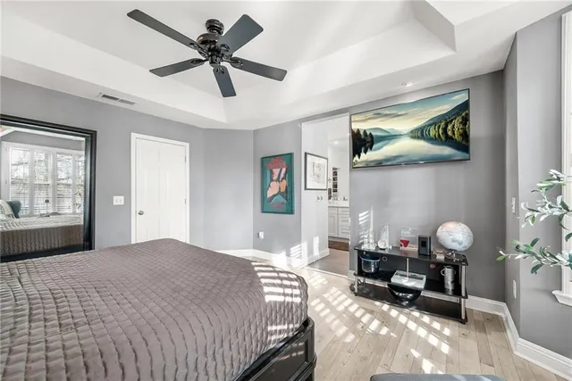 a bedroom with furniture and a window