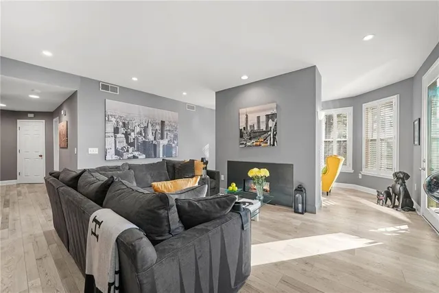 a living room with furniture and a table