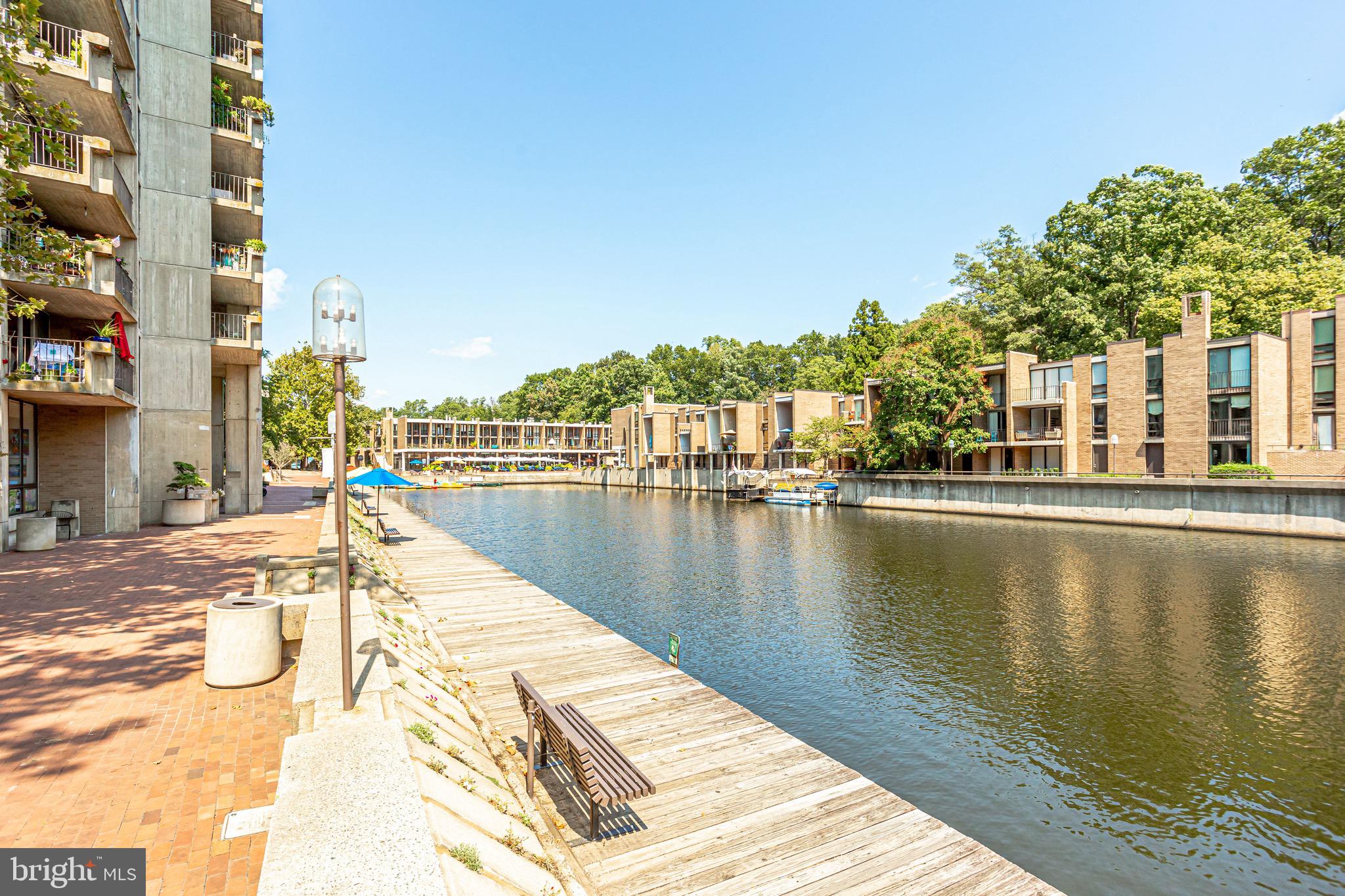 11400 Washington Plaza West, Unit 103 Reston, VA 20190 - Photo 12 of 57 a view of a lake with a water view