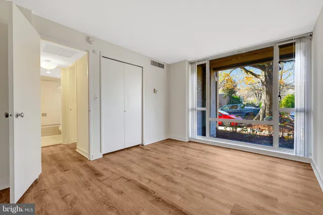 a view of a swimming pool with outdoor seating