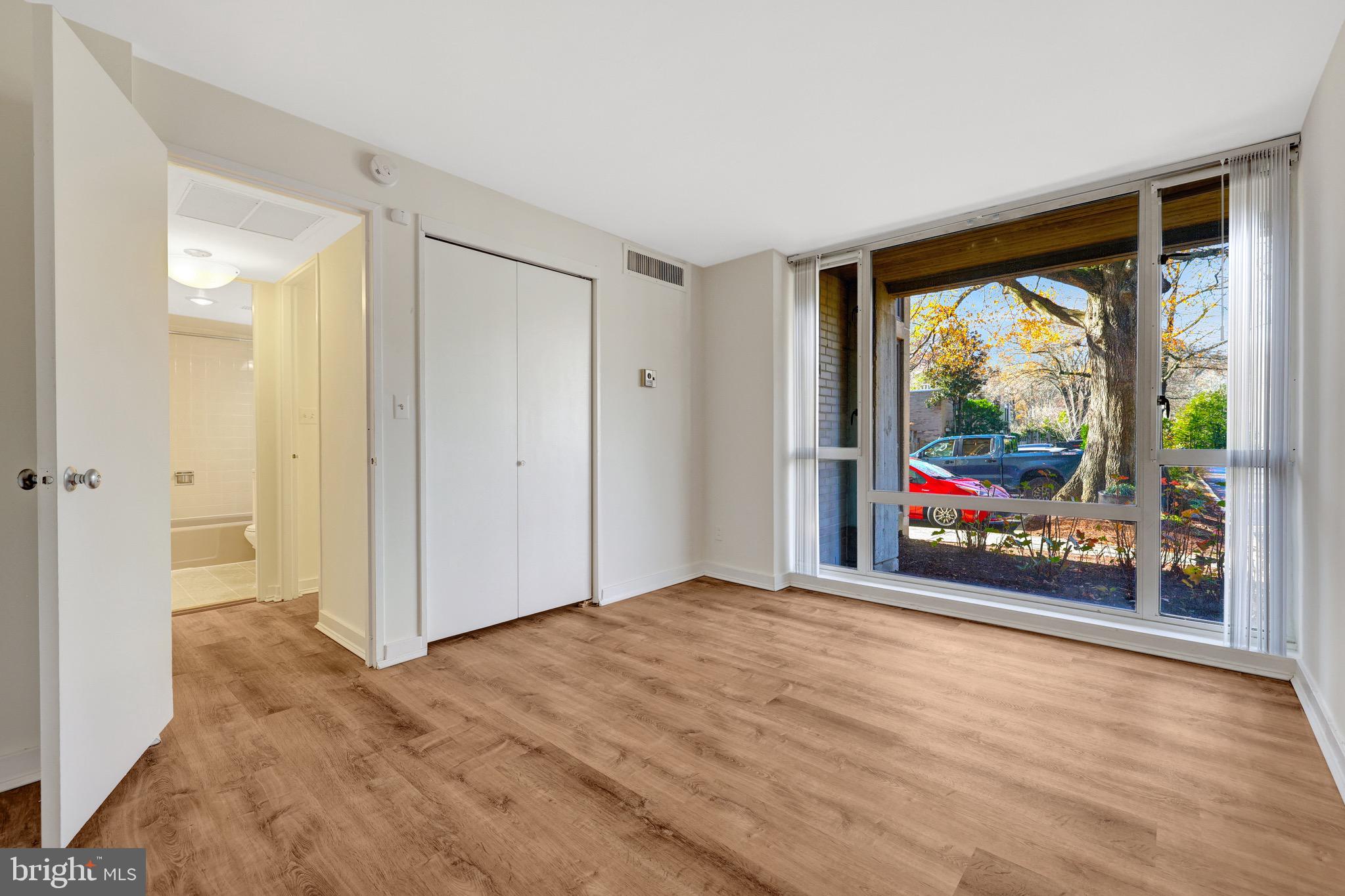 11400 Washington Plaza West, Unit 103 Reston, VA 20190 - Photo 42 of 57 a view of an empty room with a window