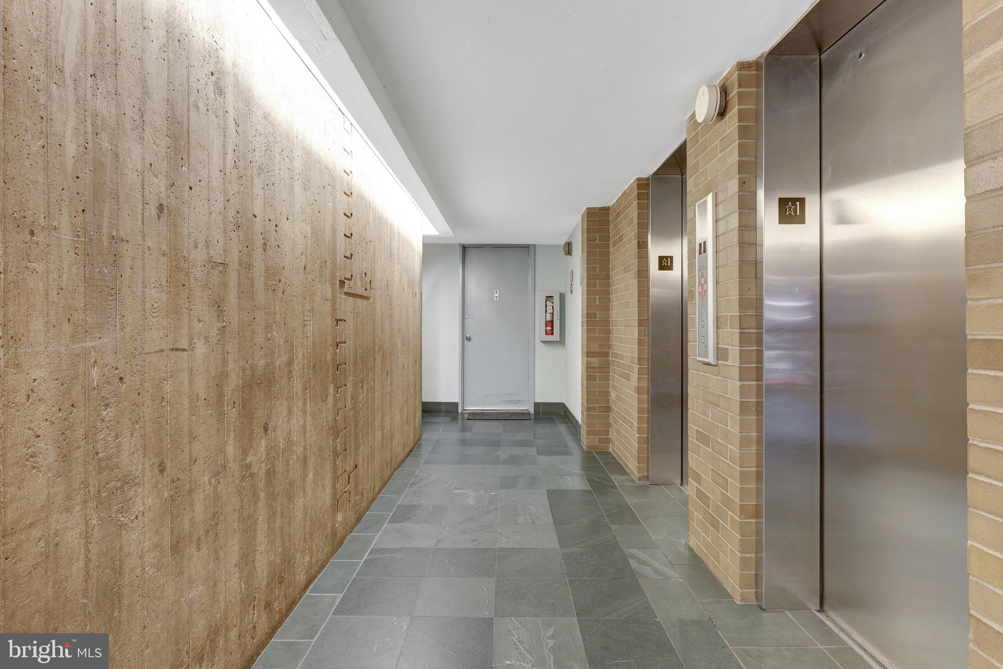 11400 Washington Plaza West, Unit 103 Reston, VA 20190 - Photo 45 of 57 a view of a hallway