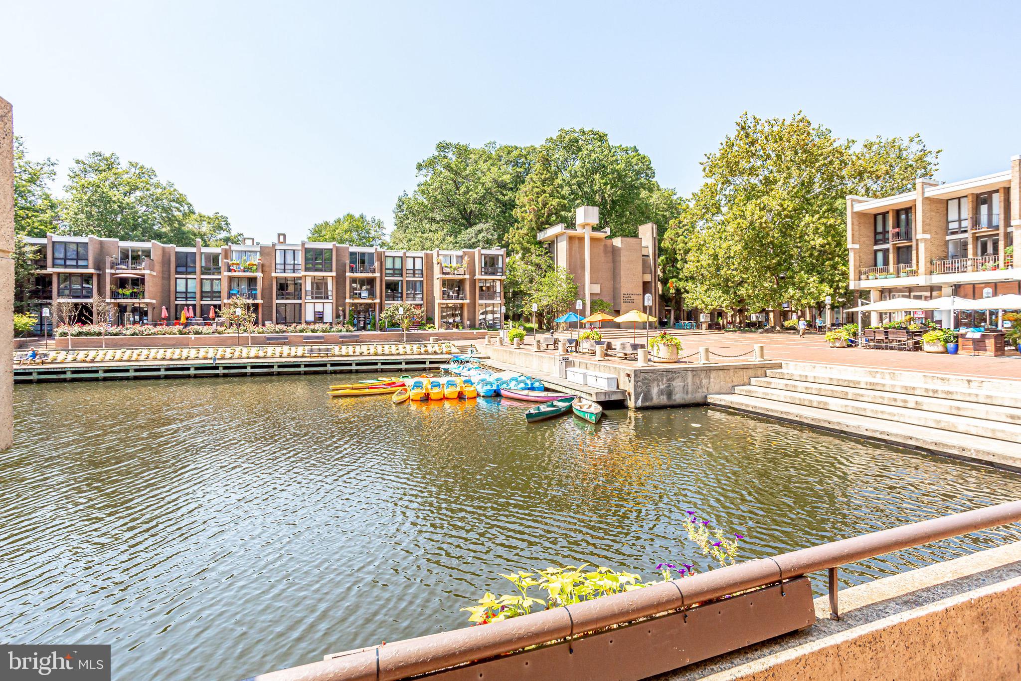 11400 Washington Plaza West, Unit 103 Reston, VA 20190 - Photo 48 of 57 a view of a swimming pool with outdoor seating