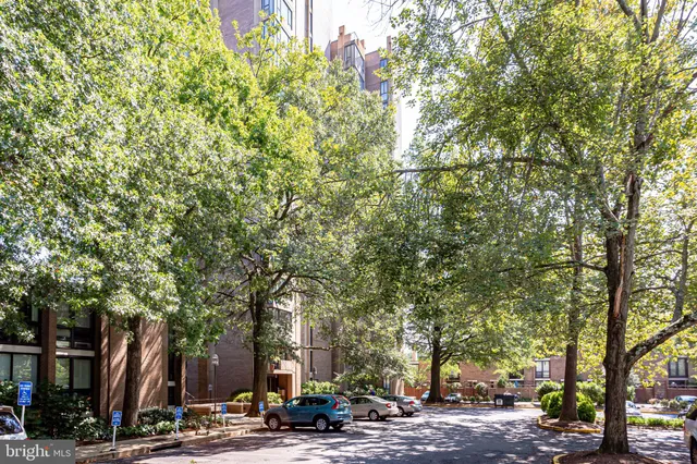 a view of a big room with windows and stairs