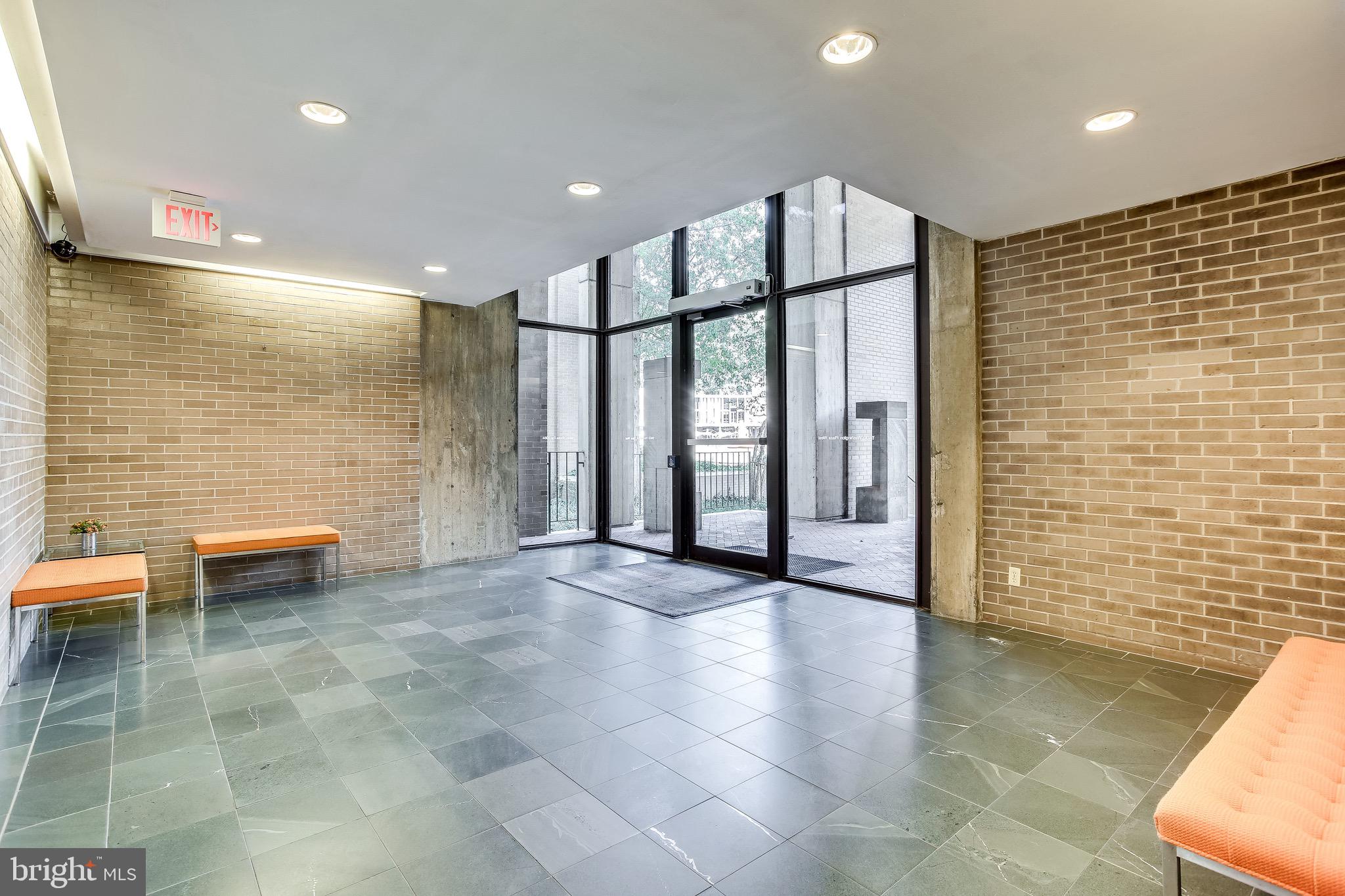11400 Washington Plaza West, Unit 103 Reston, VA 20190 - Photo 6 of 57 a view of an entryway of a building