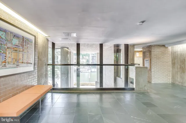 a view of a lake with a house in the background