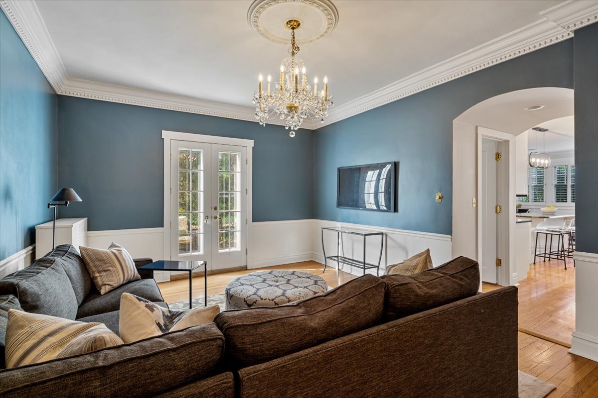 411 Sheridan Road Wilmette, IL 60091 - Photo 12 of 43 a living room with furniture and a chandelier