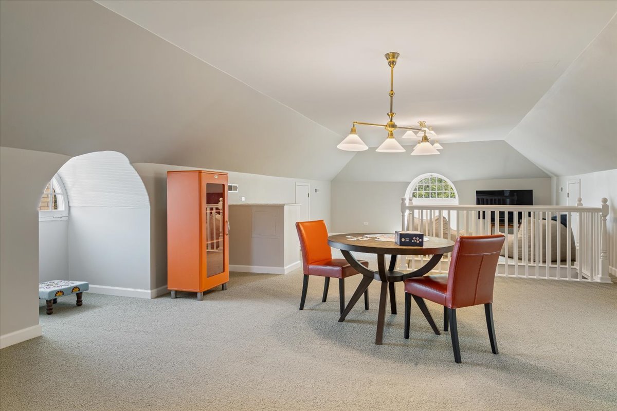 411 Sheridan Road Wilmette, IL 60091 - Photo 36 of 43 a view of a dining room with furniture and a chandelier