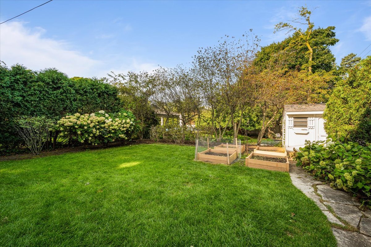 411 Sheridan Road Wilmette, IL 60091 - Photo 40 of 43 a view of a house with a yard patio and sitting area
