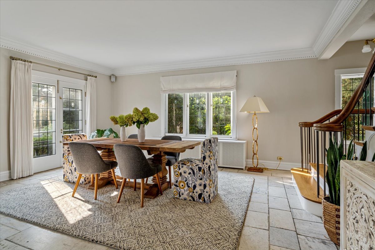 411 Sheridan Road Wilmette, IL 60091 - Photo 6 of 43 a view of a dining room with furniture and a window