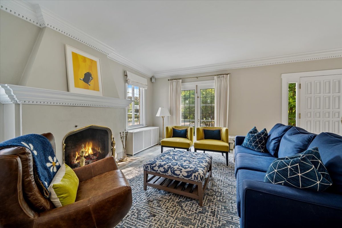 411 Sheridan Road Wilmette, IL 60091 - Photo 8 of 43 a living room with furniture and a fireplace