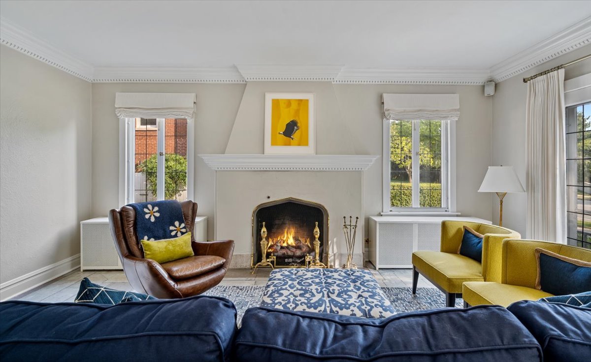 411 Sheridan Road Wilmette, IL 60091 - Photo 9 of 43 a living room with furniture and a fireplace