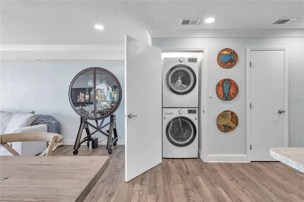 a view of entryway with wooden floor