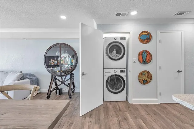 a view of entryway with wooden floor
