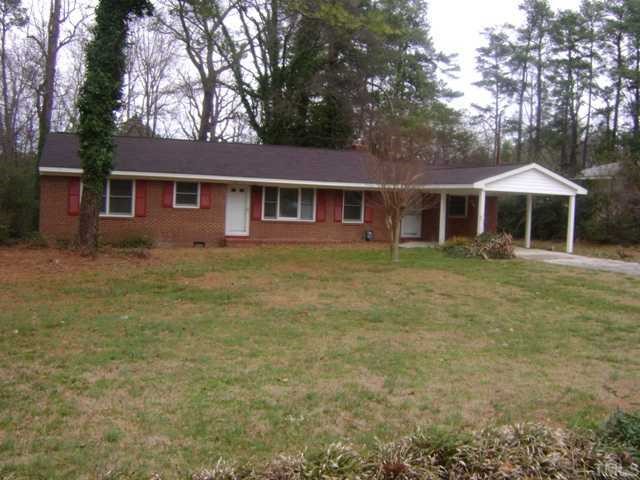 2813 Haven Road, Unit 1 Raleigh, NC 27610 - Photo 1 of 3 front view of a house with a yard