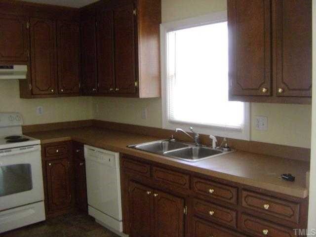 2813 Haven Road, Unit 1 Raleigh, NC 27610 - Photo 3 of 3 a kitchen with a sink and cabinets