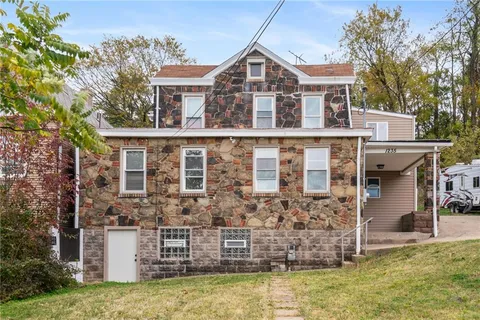 front view of house with a yard