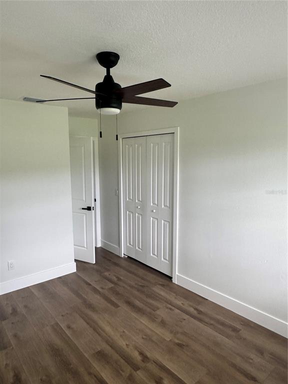 18208 State Road 52 Land O Lakes, FL 34638 - Photo 14 of 44 a view of a room with wooden floor