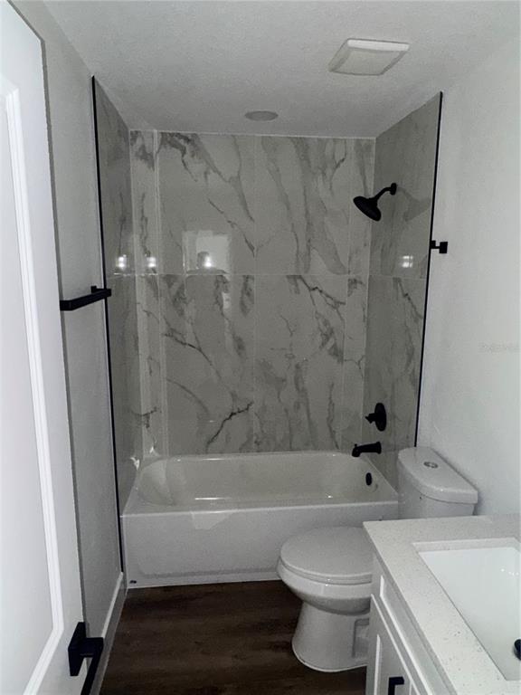 18208 State Road 52 Land O Lakes, FL 34638 - Photo 17 of 44 a bathroom with a sink toilet and shower