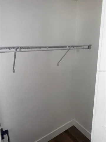 a view of small space with racks on the wall