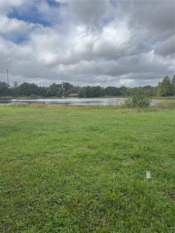 18208 State Road 52 Land O Lakes, FL 34638 - Photo 30 of 44 a view of an lake and mountain
