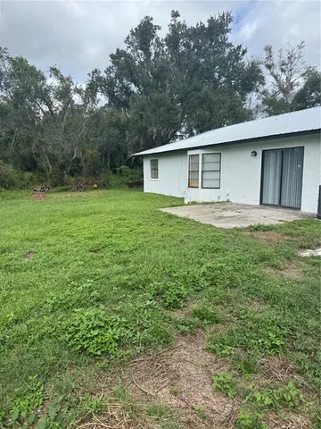 a house view with a outdoor space