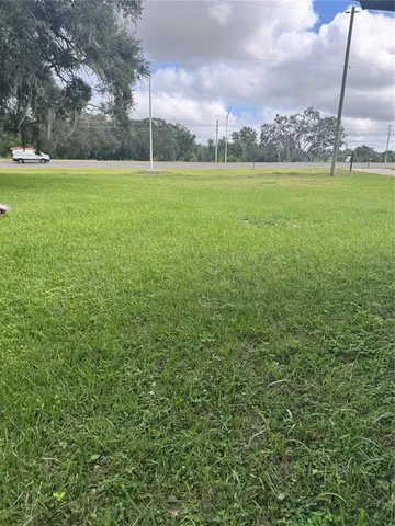 a view of outdoor space and yard