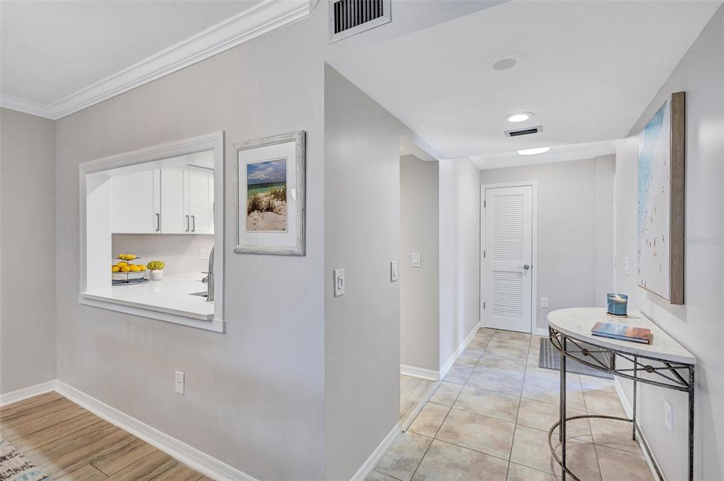 5880 Midnight Pass Road, Unit 306 Sarasota, FL 34242 - Photo 11 of 71 a view of a hallway with workspace