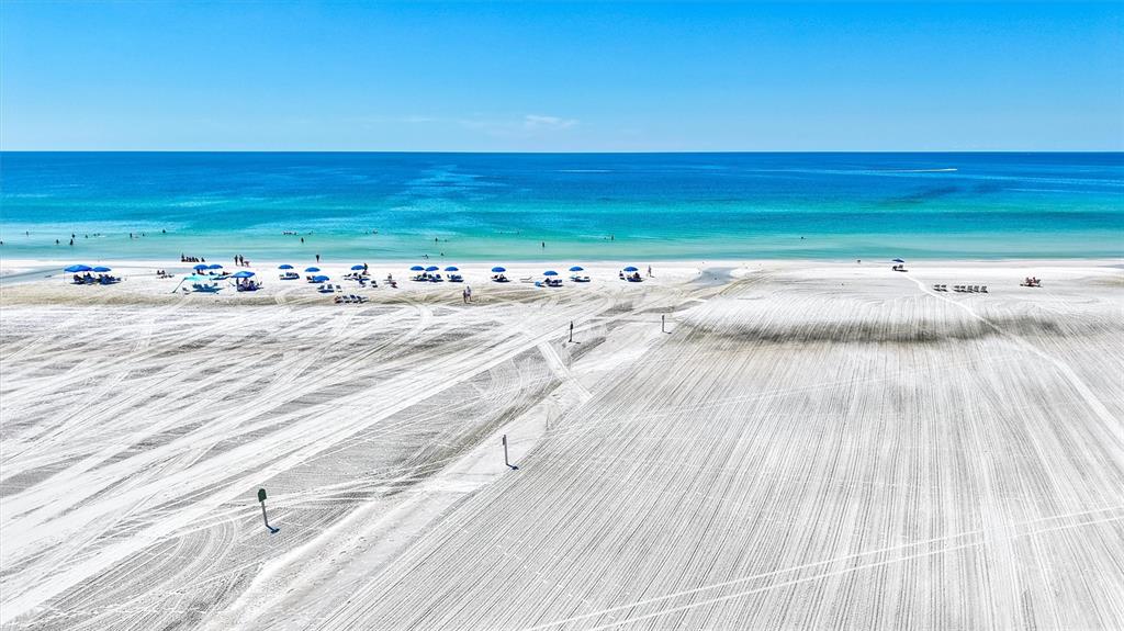 5880 Midnight Pass Road, Unit 306 Sarasota, FL 34242 - Photo 58 of 71 a view of a room with wooden floor