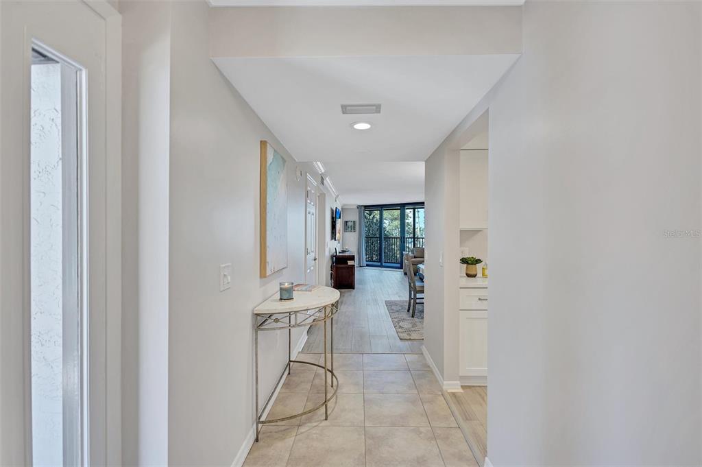 5880 Midnight Pass Road, Unit 306 Sarasota, FL 34242 - Photo 10 of 71 a very nice looking room with a big room