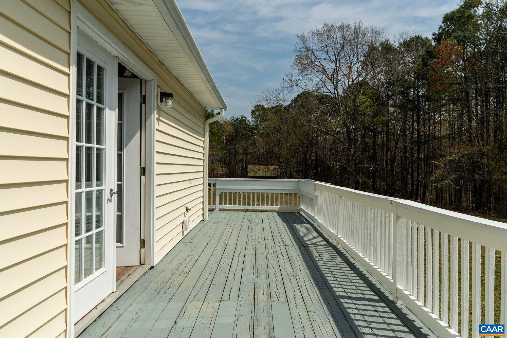 14910 Western Mill Road Lawrenceville, VA 23868 - Photo 67 of 73 a view of balcony with wooden floor and fence