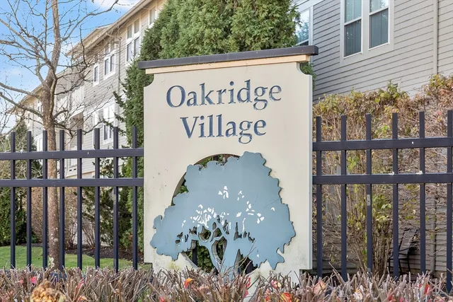 a view of a sign board with a street sign