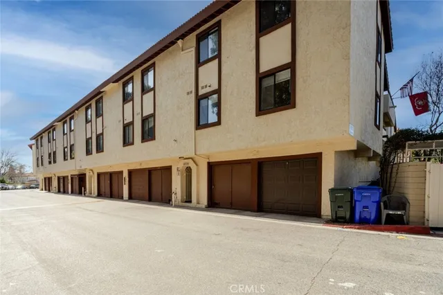 a front view of building with large windows