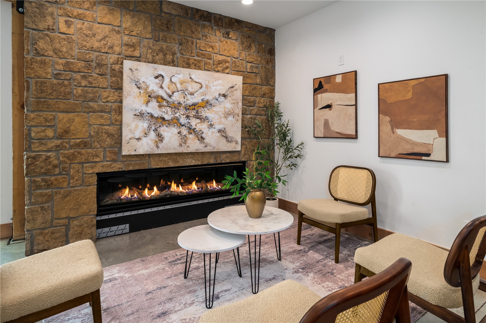 200 Sundance Court, Unit 1 Steamboat Springs, CO 80487 - Photo 25 of 50 Living area featuring a large fireplace