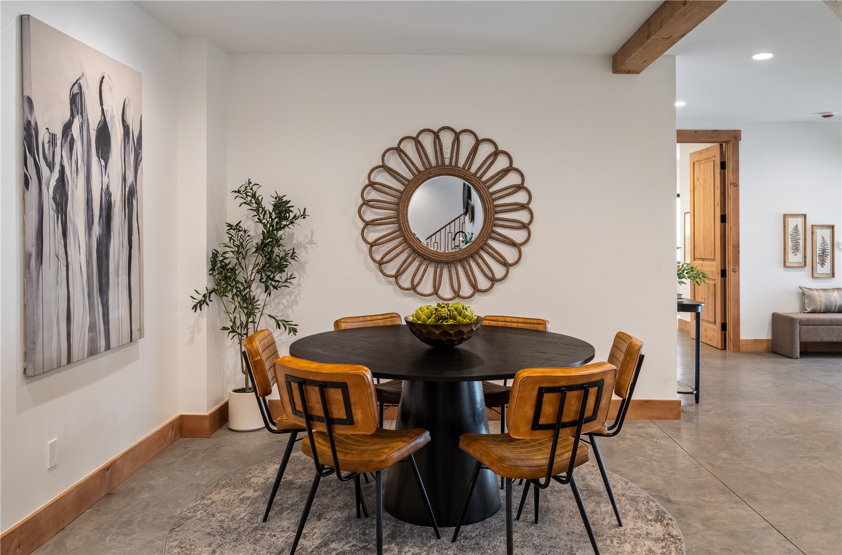 200 Sundance Court, Unit 1 Steamboat Springs, CO 80487 - Photo 27 of 50 Dining space with recessed lighting, beam ceiling, and concrete floors